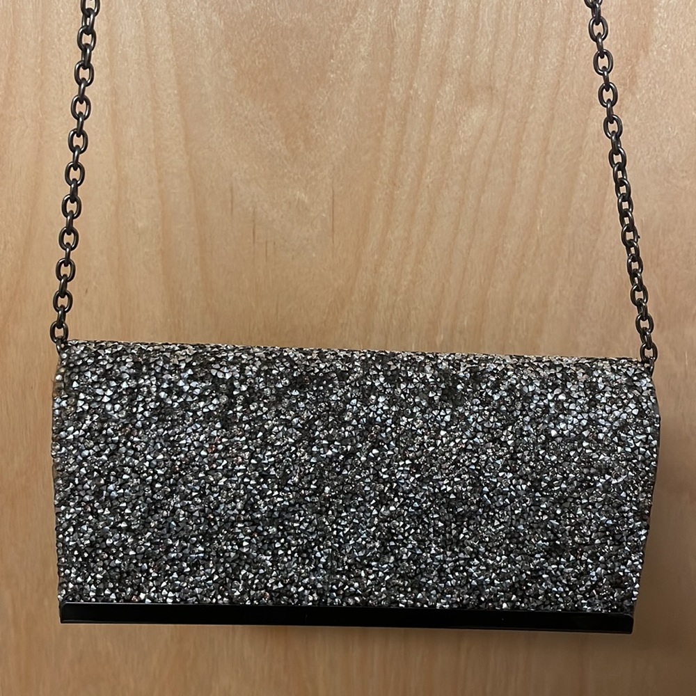 Saks Fifth Avenue sparkly gemstones clutch with chain link strap.